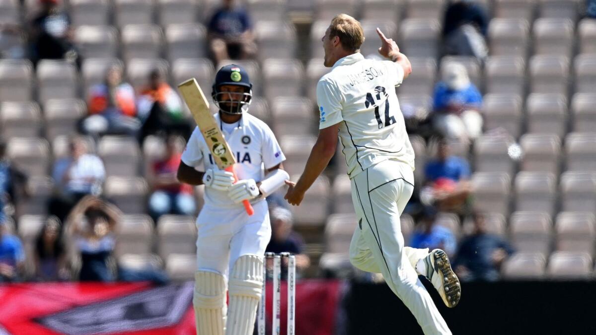 New Zealand's Kyle Jamieson celebrates the wicket of India's Cheteshwar Pujara. (AFP)