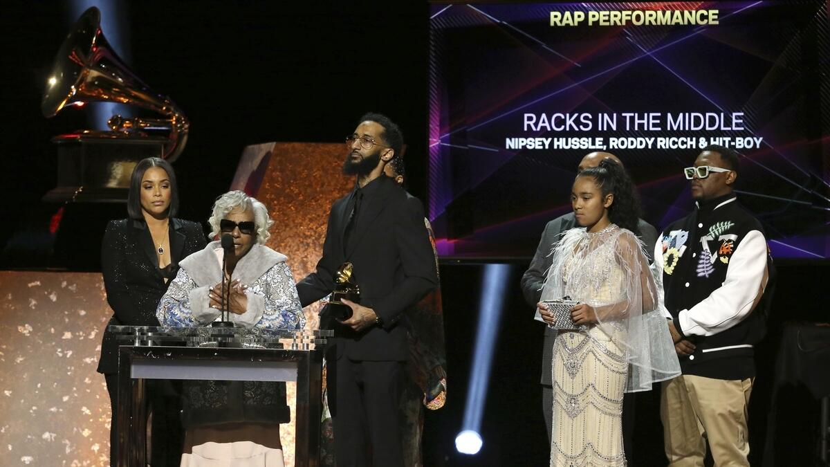 Hussle’s family, including his brother, grandmother and actress-fiancee Lauren London, accepted the honor during the pre-telecast.