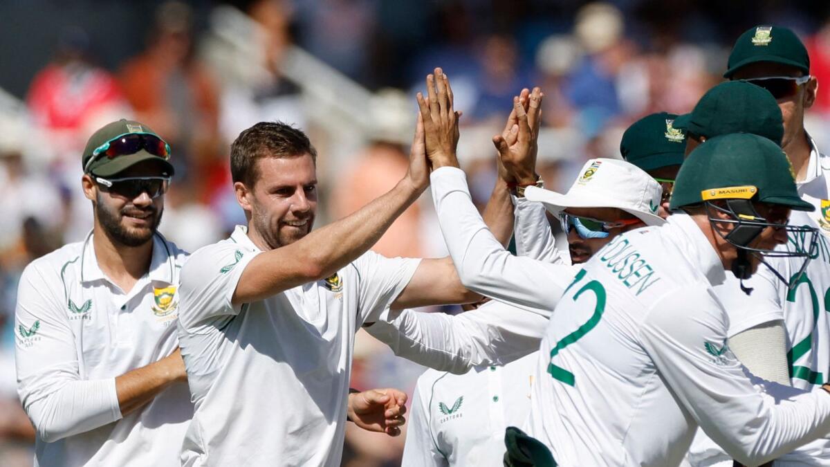 South Africa's Anrich Nortje celebrates with teammates after taking the wicket of England's Alex Lees. (Reuters)