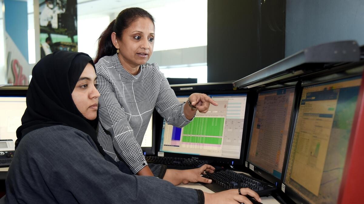 Nuha Al Yafei, Licensed Flight Dispatcher and Bindu Nair, Duty Dispatch Manager working from Network Control for EK 225.