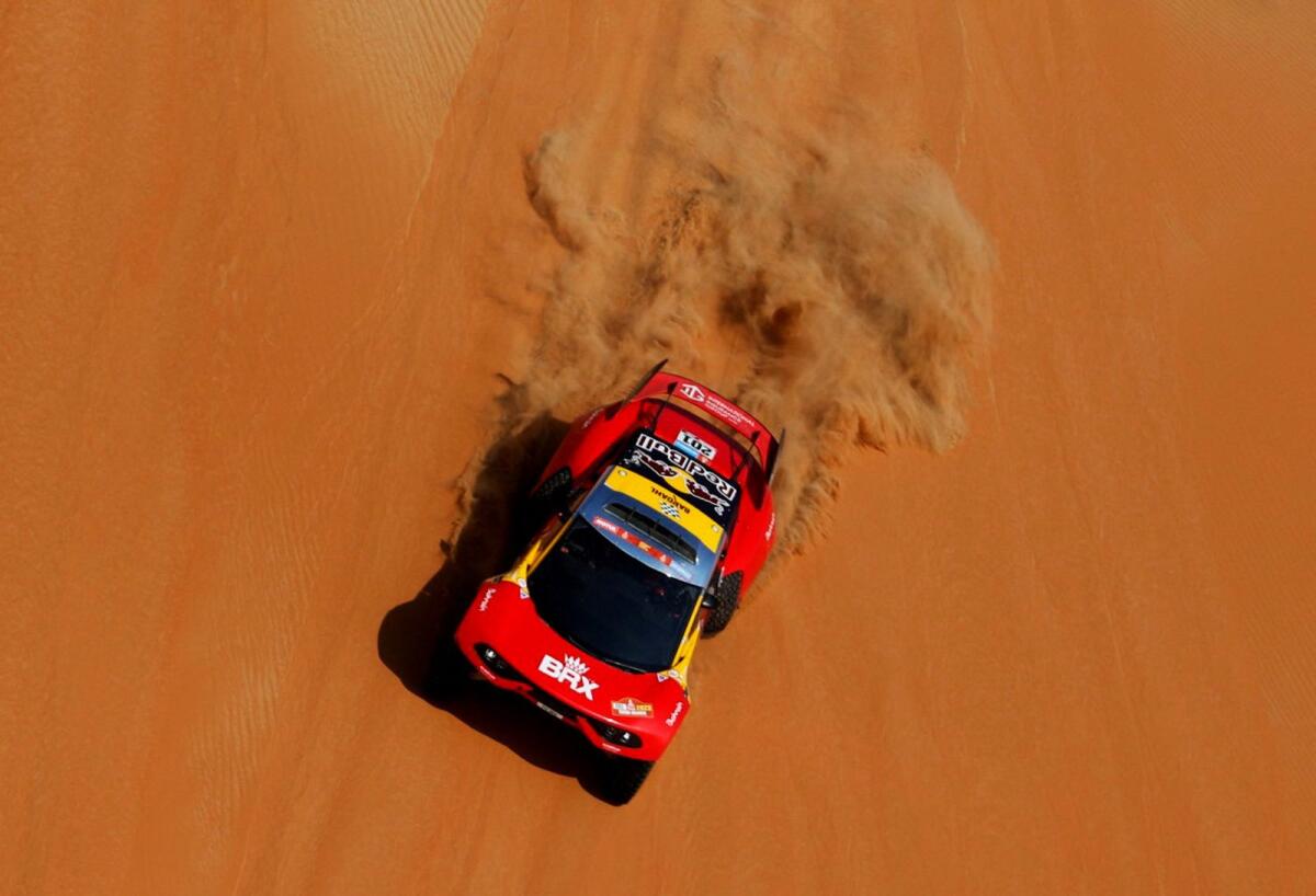 Bahrain Raid Xtreme's Sebastien Loeb and co-driver Fabian Lurquin in action. — Reuters