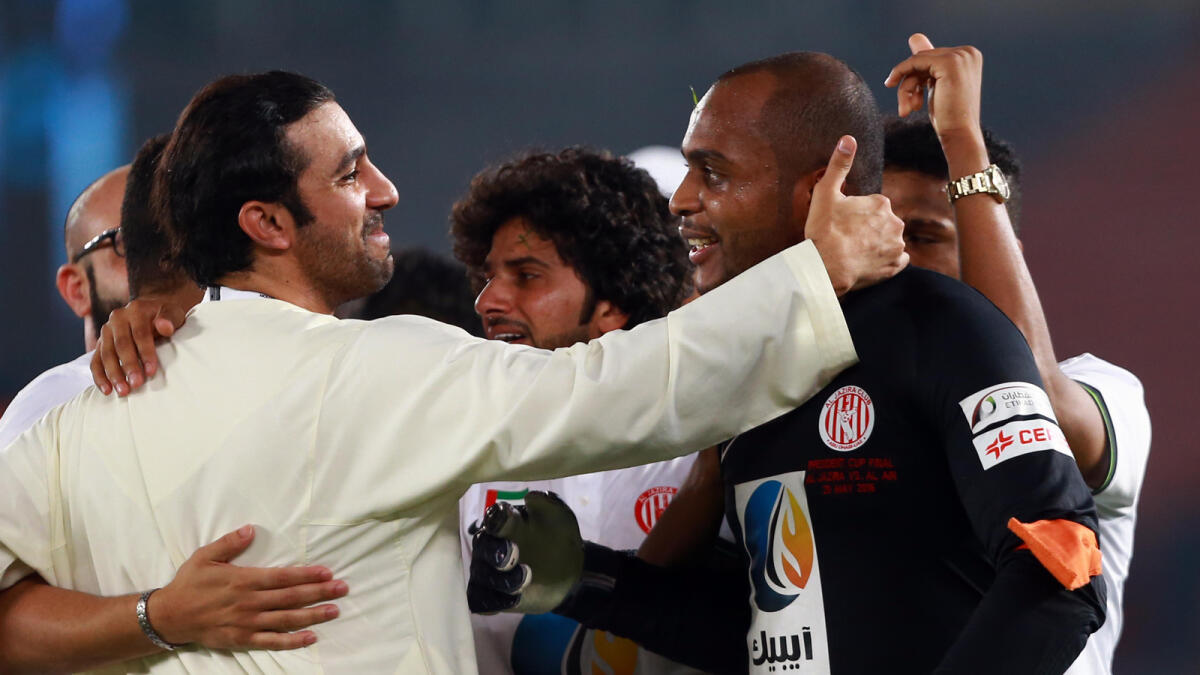Goalkeeper Ali Khaseif is congratulated after the final of the President’s Cup match on Sunday night. — Photo by Nezar Belout