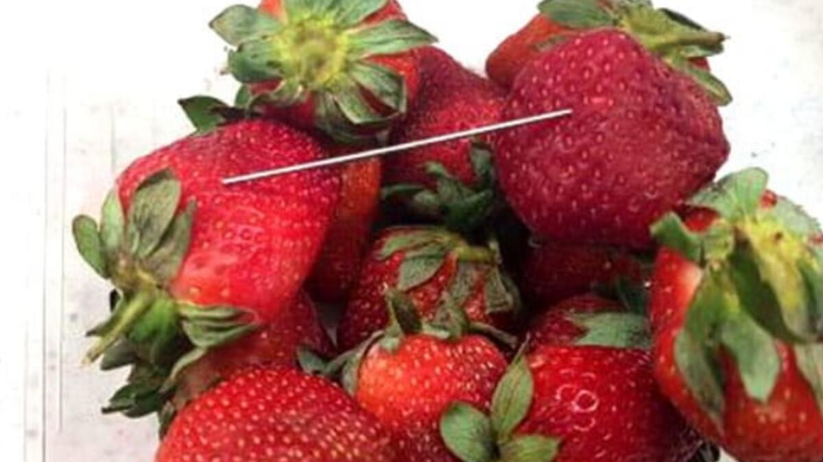 50-year-old woman arrested over strawberry needle scare