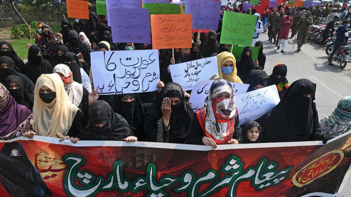 Women holding banners and placards take part in a march on the International Women's Day in Lahore on March 8. Photo used for illustration purpose only.