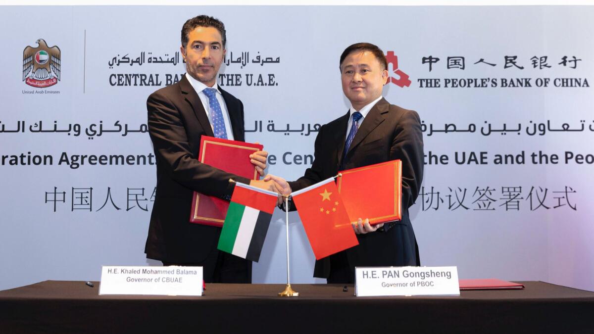 Khaled Mohamed Balama, Governor of CBUAE, and Pan Gongsheng, Governor of the People’s Bank of China, signed the agreement and the MoU in Hong Kong. — Supplied photo