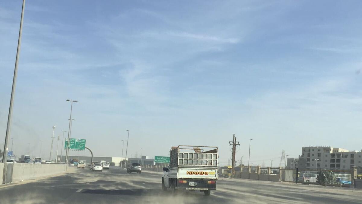 Strong winds swirl dust on the Latifa bint Hamdan Road in Dubai (Photos by Dhes Handumon)