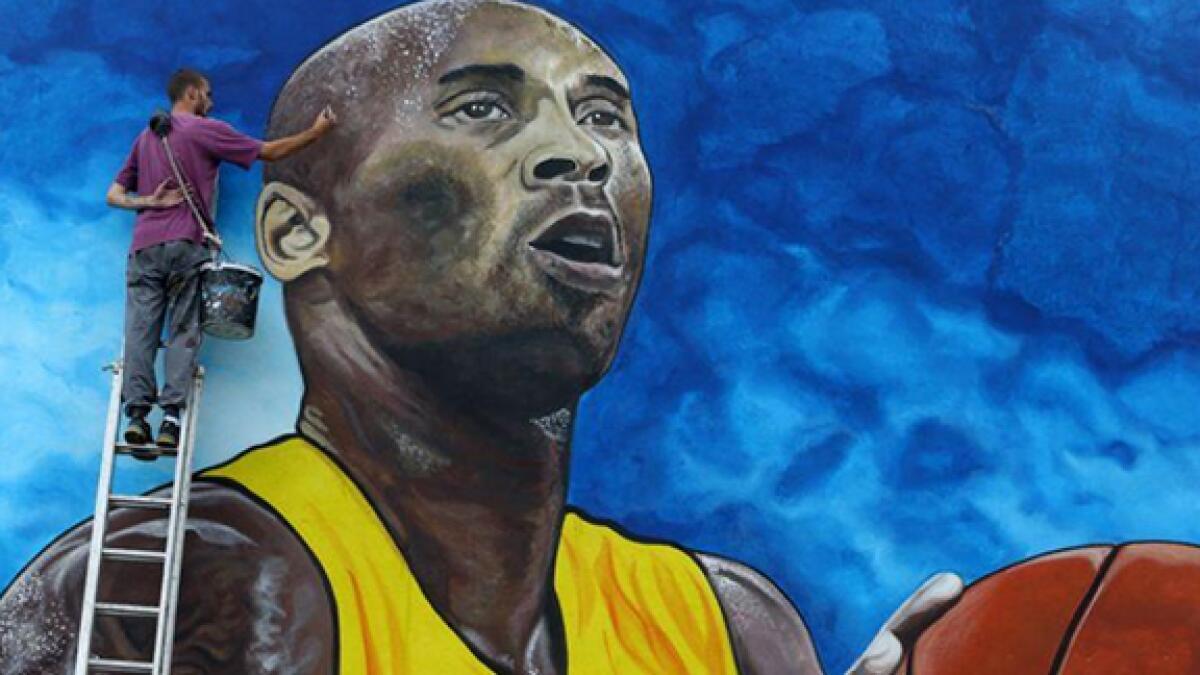 An artist  in Gradiska, Bosnia and Herzegovina paints works on a mural to honour former Lakers star Kobe Bryant. -- Twitter