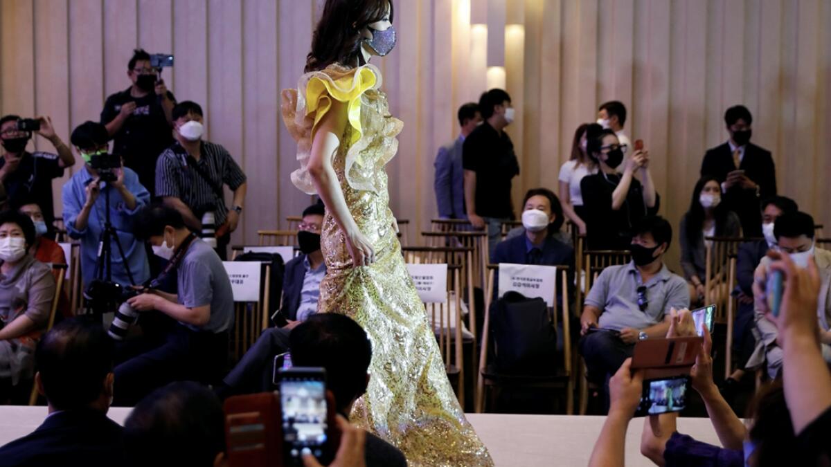 A model presents a creation during a fashion show, wearing a mask as a measure to avoid the spread of the coronavirus disease (Covid-19), in Seoul, South Korea. Photo: Reuters&lt;p&gt;&lt;/p&gt;(Research: Mohammad Thanweeruddin/Khaleej Times)