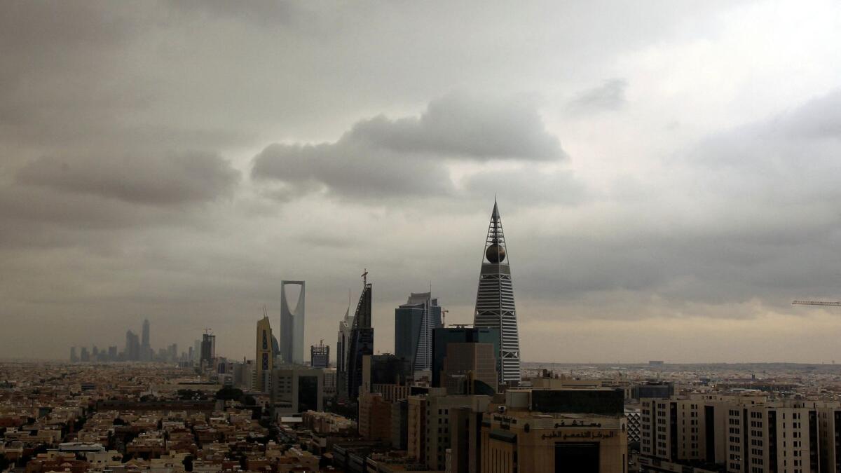 Clouds move over the Riyadh skyline. Saudi Arabia has spent heavily on initiatives to diversify its economy. — Reuters file