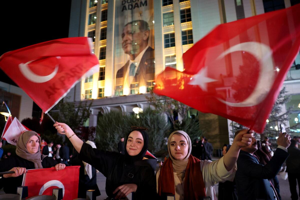 Supporters of Turkish president and the ruling Justice and Development (AK) Party wave flags. Photo: AFP