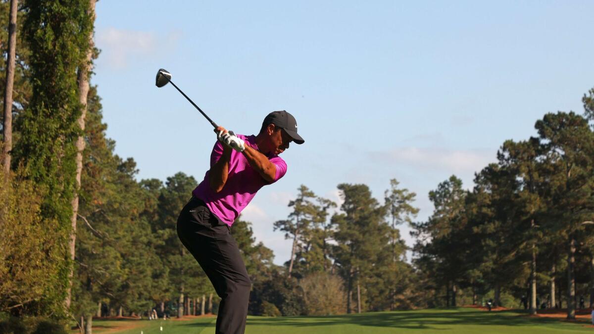 Tiger Woods of the United States plays his shot from the 17th tee. — AFP