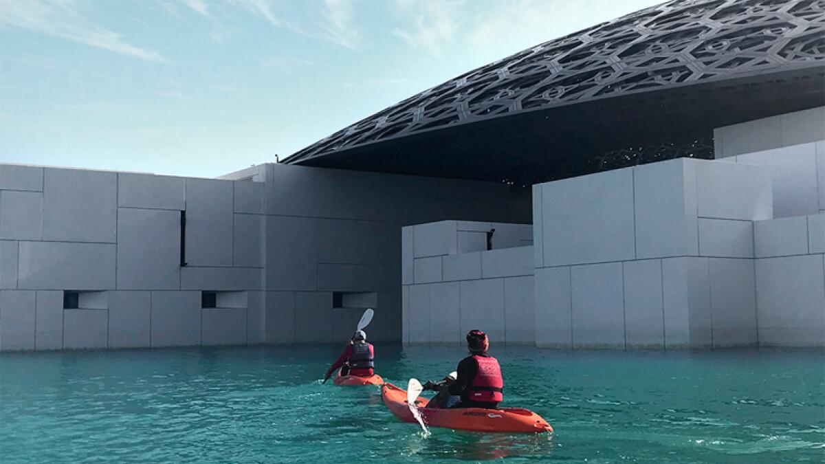Now, take a kayak around Louvre Abu Dhabis waters