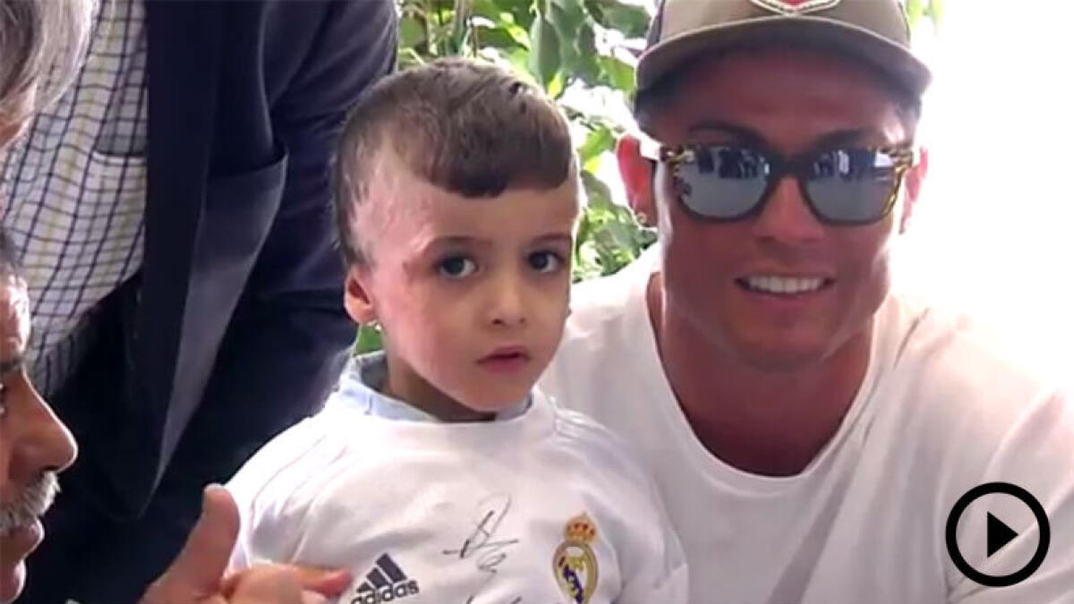 Palestinian orphaned by bombing meets Cristiano Ronaldo