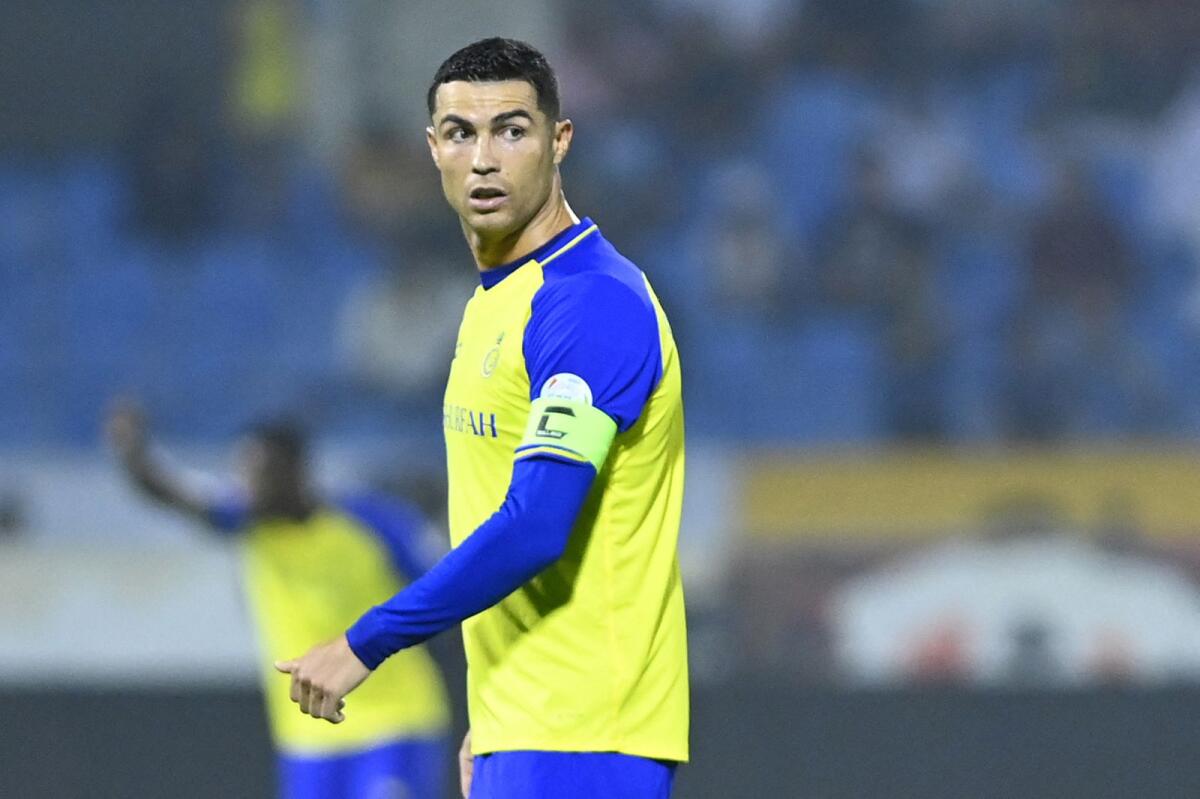 Al Nassr's Cristiano Ronaldo looks on during a Saudi Pro League match. — AFP