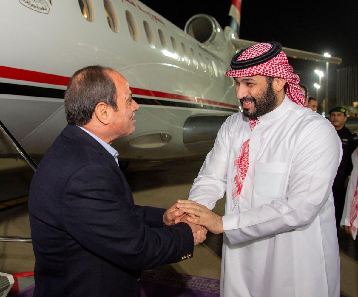 Saudi Crown Prince Mohammed bin Salman receives Egyptian President Abdel Fattah Al Sisi in Jeddah, Saudi Arabia, on Monday. -- Reuters