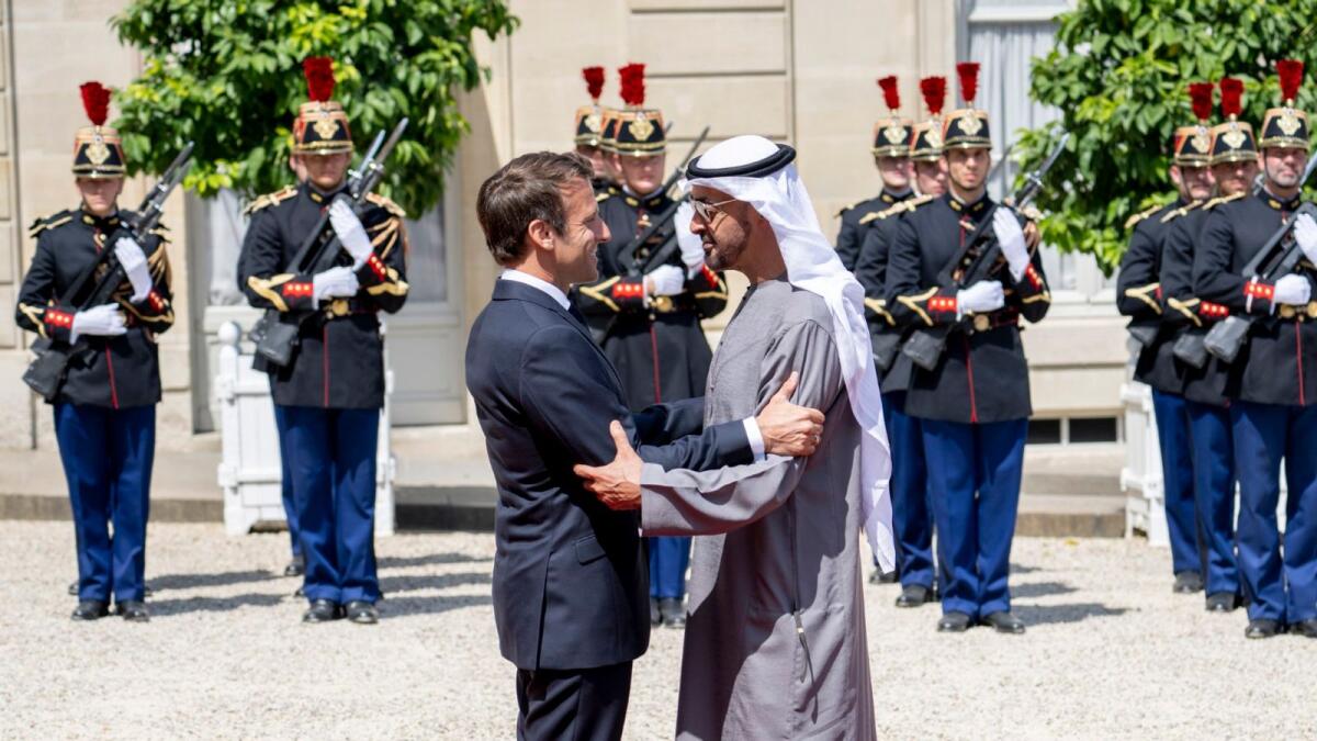 Sheikh Mohamed bin Zayed Al Nahyan, President of the United Arab Emirates (R) is received by Emmanuel Macron, President of France (L), at the Elysee Palace.