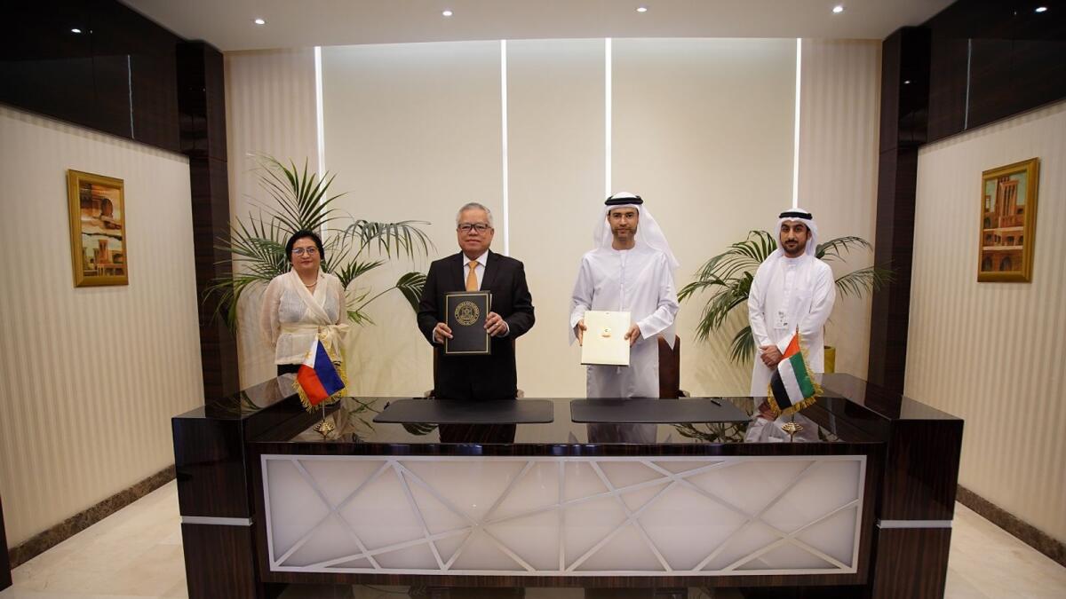 Mohamed bin Hadi Al Hussaini, Minister of State for Financial Affairs, singed the agreement on behalf of the Government of the UAE, while Ramon M. Lopez, Philippine’s secretary (minister) of Trade and Industry signed it on behalf of the Filipino side. — Supplied photo