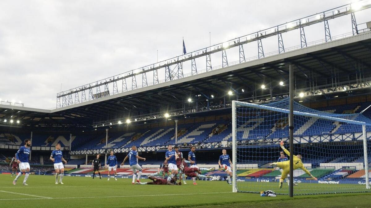 Aston Villa's Ezri Konsa scores against Everton. - Reuters