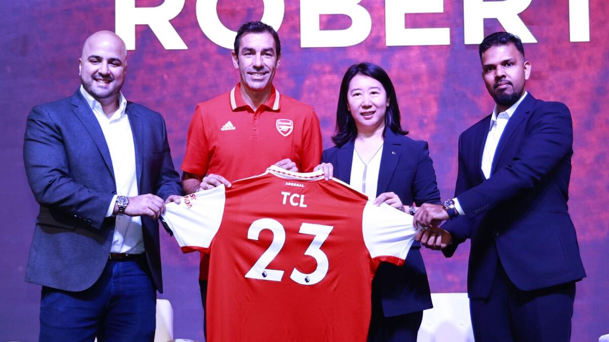 From left:  Majid Khan Niazi, Brand Development and Digital Marketing Manager - TCL MEA ,  Robert Pires, former Arsenal player, Sunny Yang, General Manager - TCL MEA and Mr. Mohammed Minhajudeen, Marketing Manager - TCL MEA. — Supplied photo