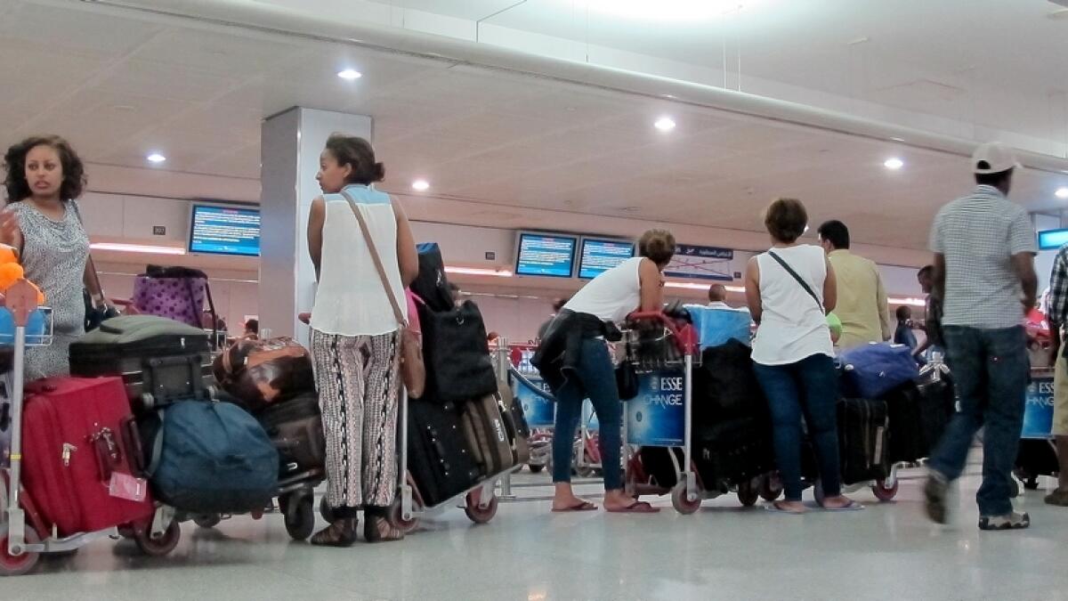 Passengers waiting for their flight at Terminal 1 in Dubai.-Photo by Juidin Bernarrd/Khaleej Times 