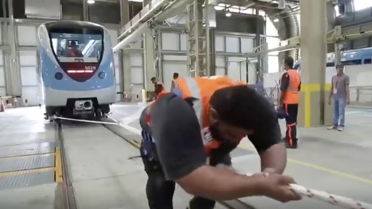 Fitness challenge: 25 RTA staff pull Dubai Metro train for 25 metres