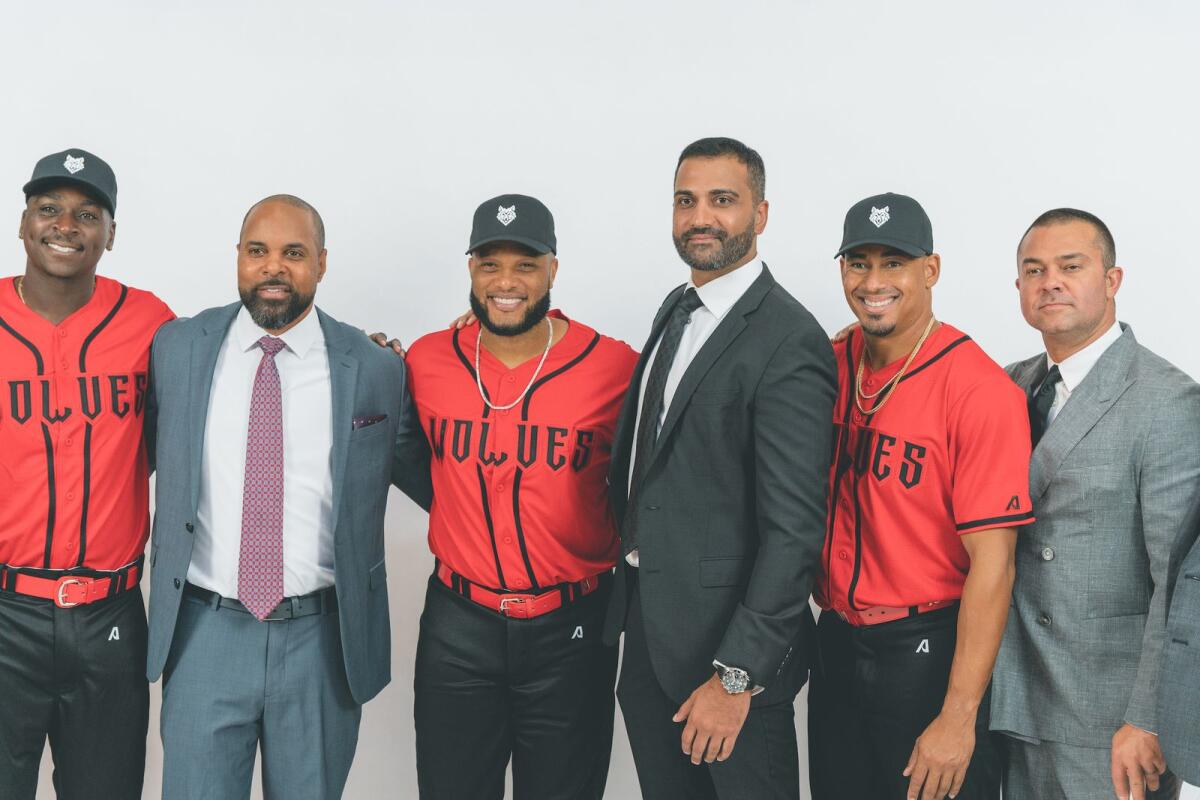 Kash Shaikh (third from right), Chairman, CEO, and Majority Owner, Baseball United, with draft picks of Team Wolves — Supplied photo
