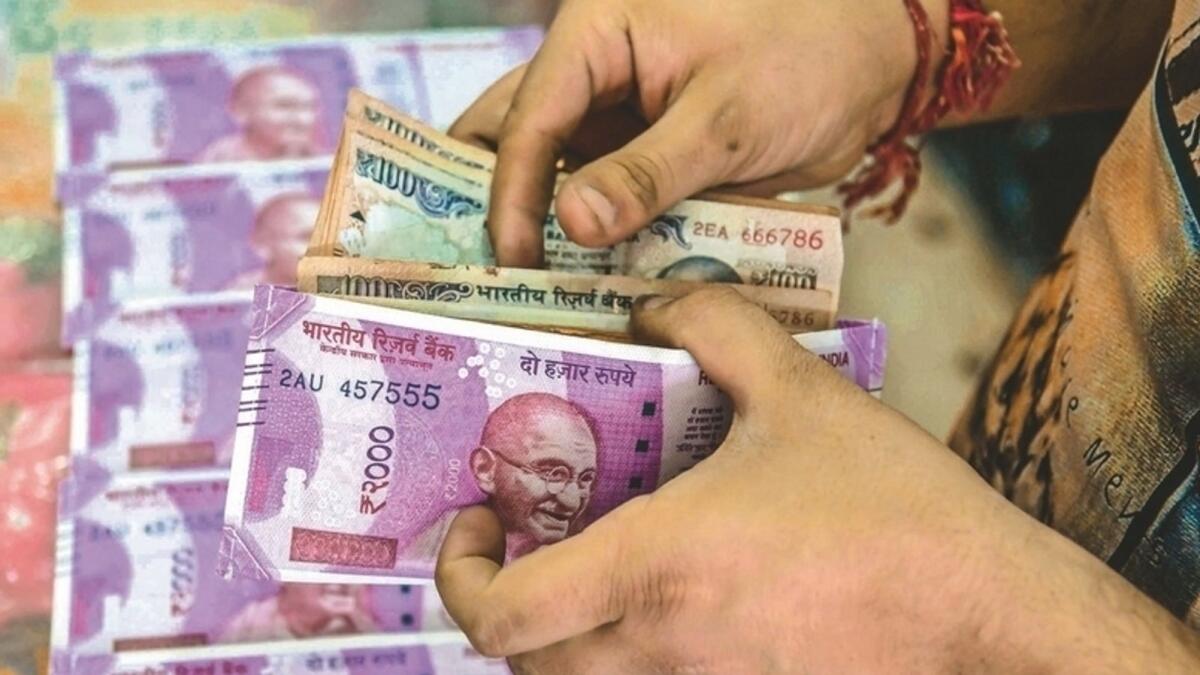 The rupee has been trading in a narrow range band of 8 -12 paise for quite some time. It  rested at 73.49 against the dollar. — File photo