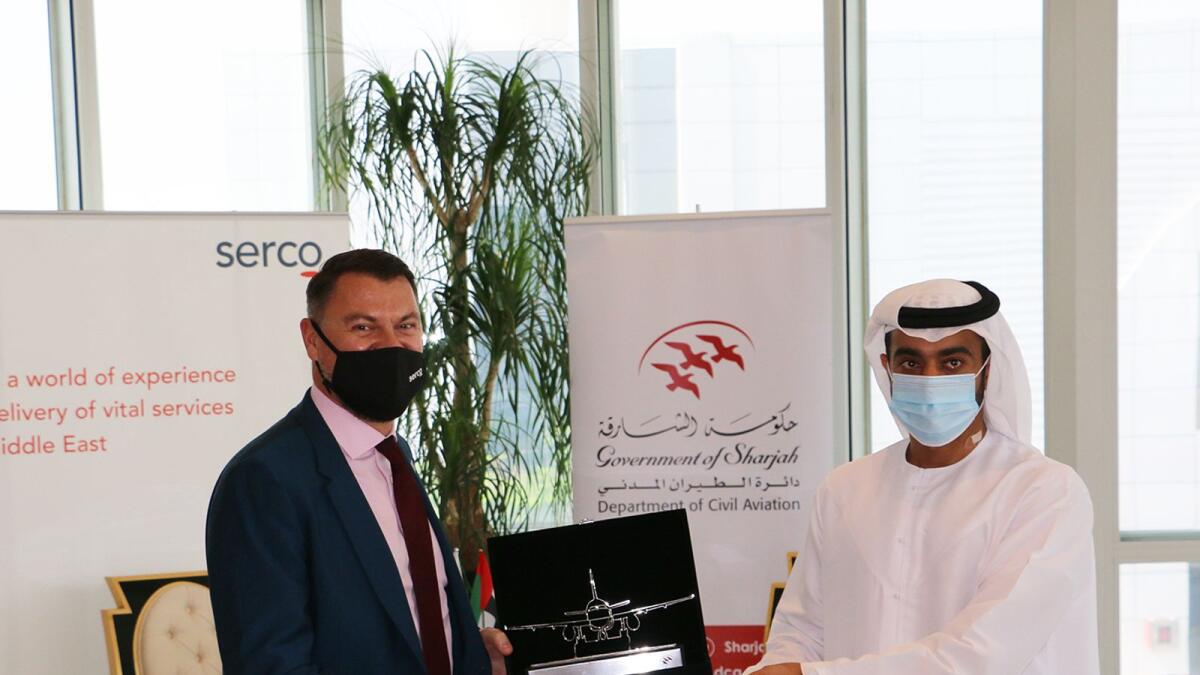 Sheikh Khalid Isam Al Qassimi, Chairman of the Department of Civil Aviation, Sharjah, and Phil Malem, CEO, Serco Middle East.