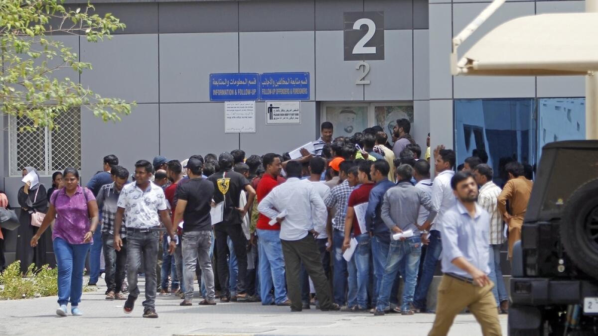 Amnesty seekers line up to get their out pass at the General Directorate Of Residency And Foreigners Affairs in Sharjah.- Photo by M. Sajjad
