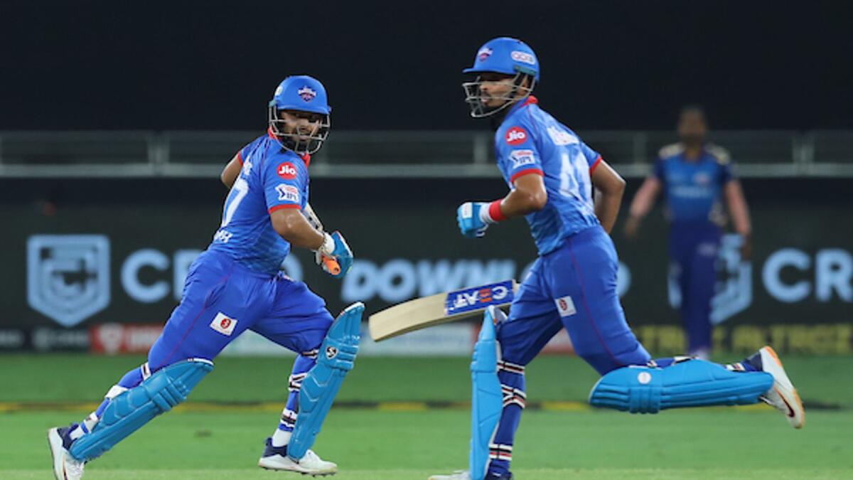 Delhi Capitals captain Shreyas Iyer (right) and Rishabh Pant run between the wickets during the IPL final against the Mumbai Indians in Dubai on Tuesday. — BCCI/IPL