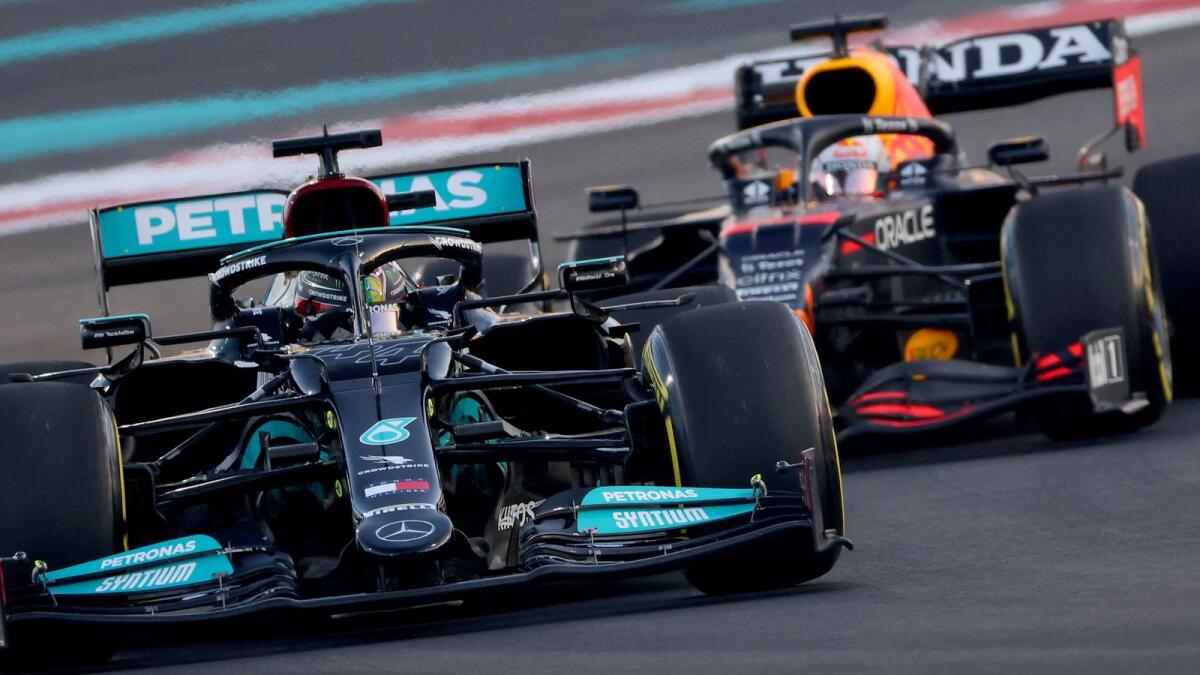 Mercedes driver Lewis Hamilton (left) and Red Bull driver Max Verstappen at the Yas Marina Circuit during the second free practice session of the Abu Dhabi Formula One Grand Prix. (AFP)