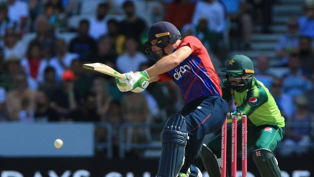 Jos Buttler hits a shot during the second T20 international against Pakistan. — AFP