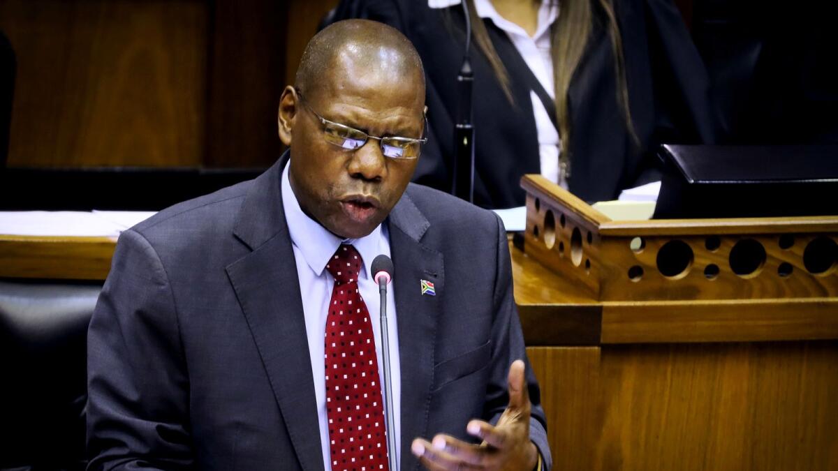 South African Health Minister Dr Zweli Mkhize confirms the first case of coronavirus in South Africa at Parliament in Cape Town, South Africa, March 5, 2020.