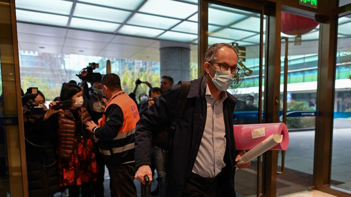 AFP file photo of WHO team members leave for Wuhan to investigate the origins of coronavirus.