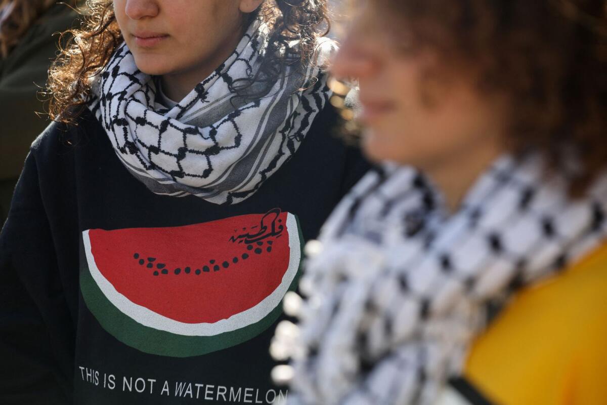 A woman wears a shirt with an image of watermelon during a protest in support of Palestinians in Gaza in Amman, Jordan,  on December 22, 2023.— Reuters