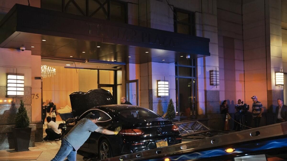 Video: Three injured after man drives car into lobby of Trump Plaza