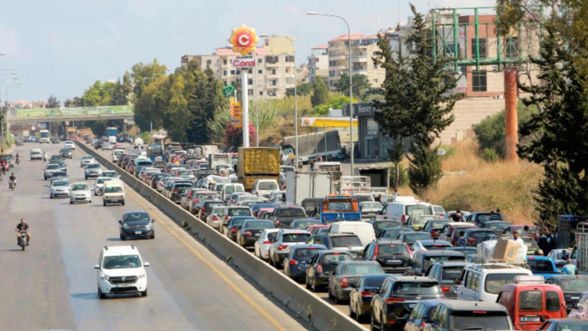 Cars stuck in a traffic jam near a gas station in Damour, Lebanon. — Reuters