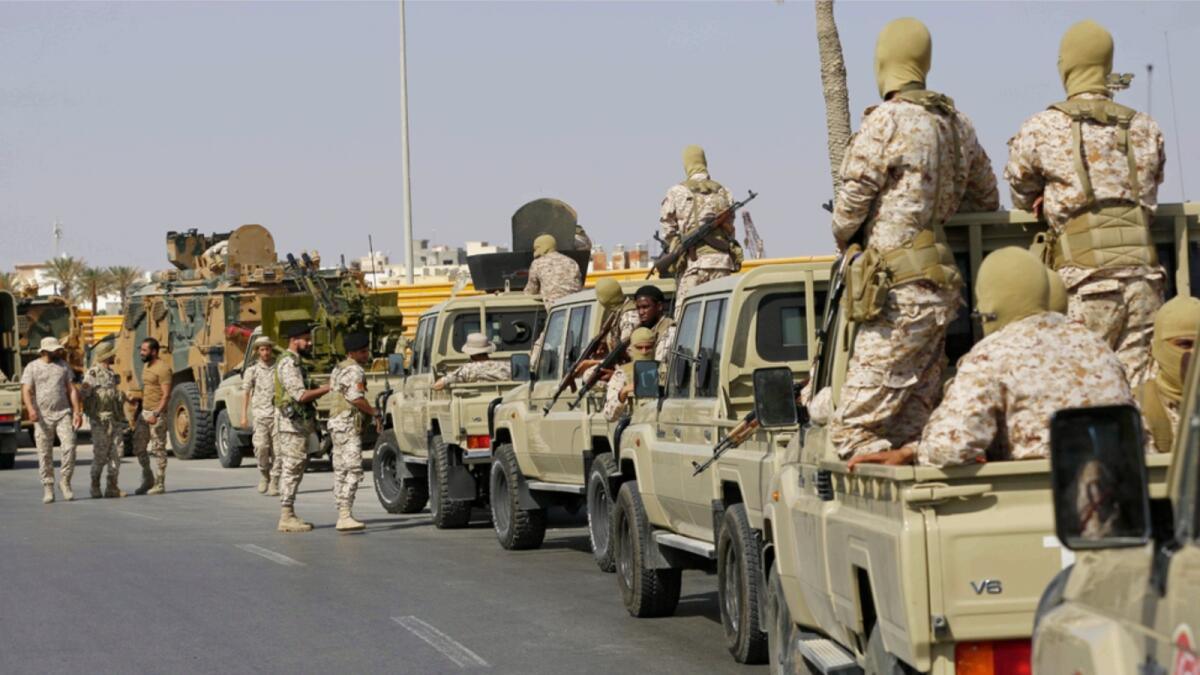 Forces loyal to Abdul Hamid Dbeibah, one of Libya's two rival prime ministers, secure the streets of the capital, Tripoli. — AP file
