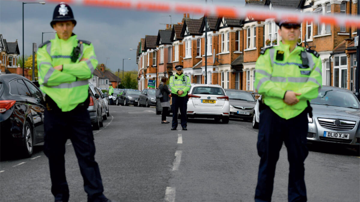 UK police shoot one, arrest 6 others in anti-terror raids