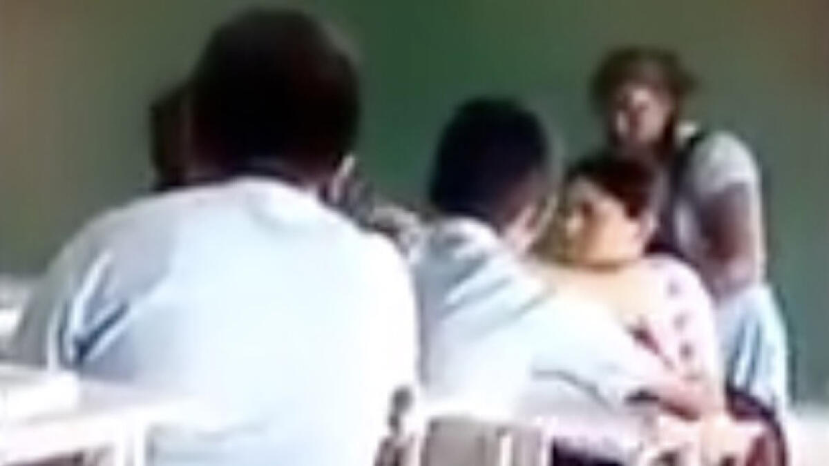 Video: Teacher gets head massage from student in class