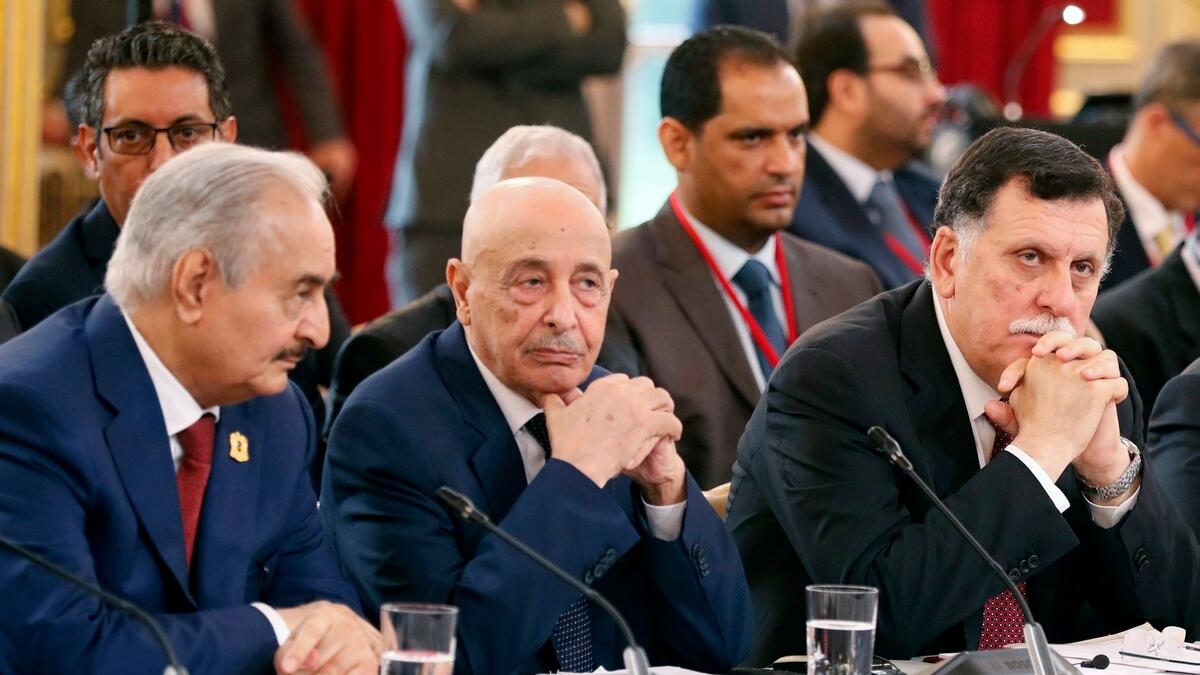 Libyan strongman Khalifa Haftar, speaker of the eastern-based parliament Aguila Saleh Issa, and head of the Tripoli-based UN-recognised unity government Fayez Al Sarraj, attend an International Congress on Libya in Paris.