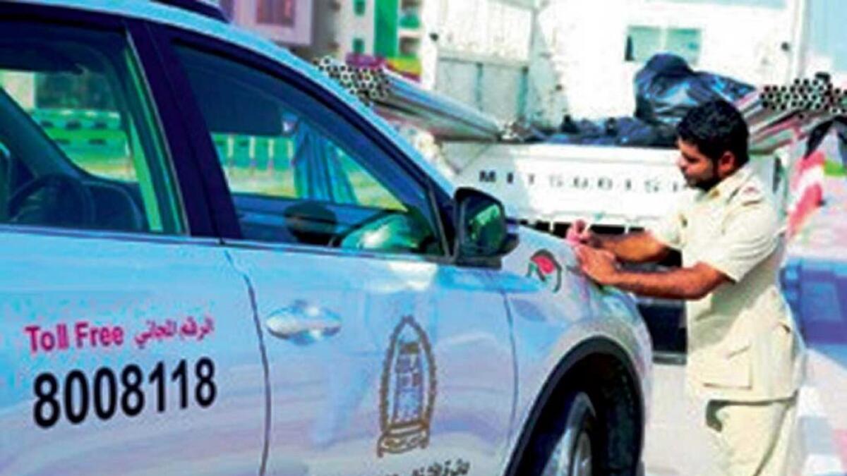 An inspector with Raqib patrols issues a fine against a driver for an anti-environment violation in Ras Al Khaimah. 