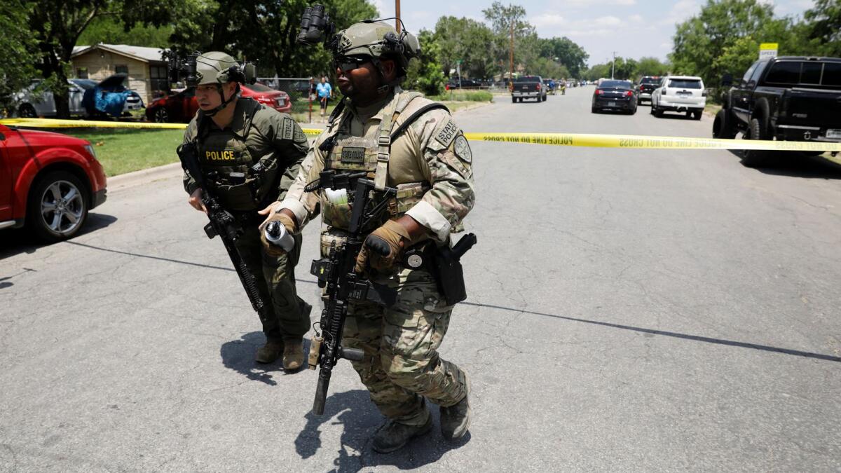 Law enforcement personnel at Robb Elementary School in Uvalde on May 24. (Reuters)