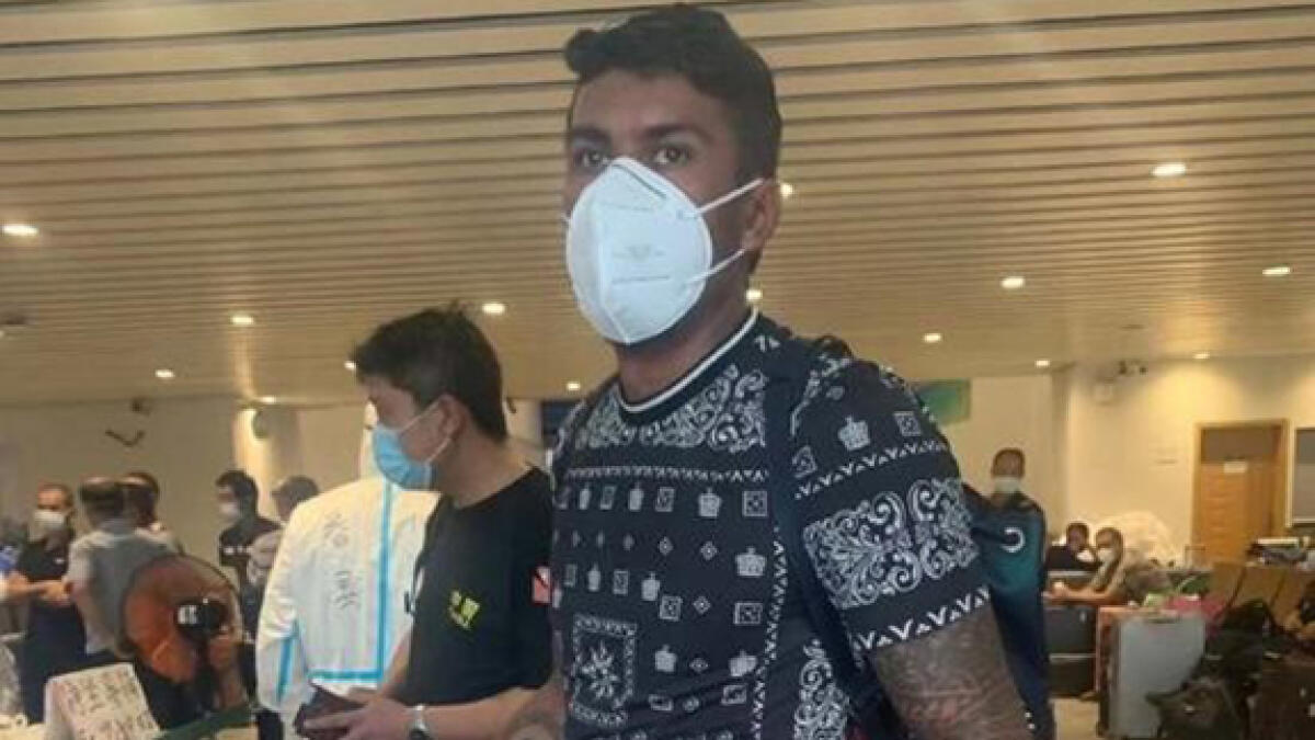 Guangzhou Evergrande's Paulinho was pictured landing in China on Tuesday. -- Twitter