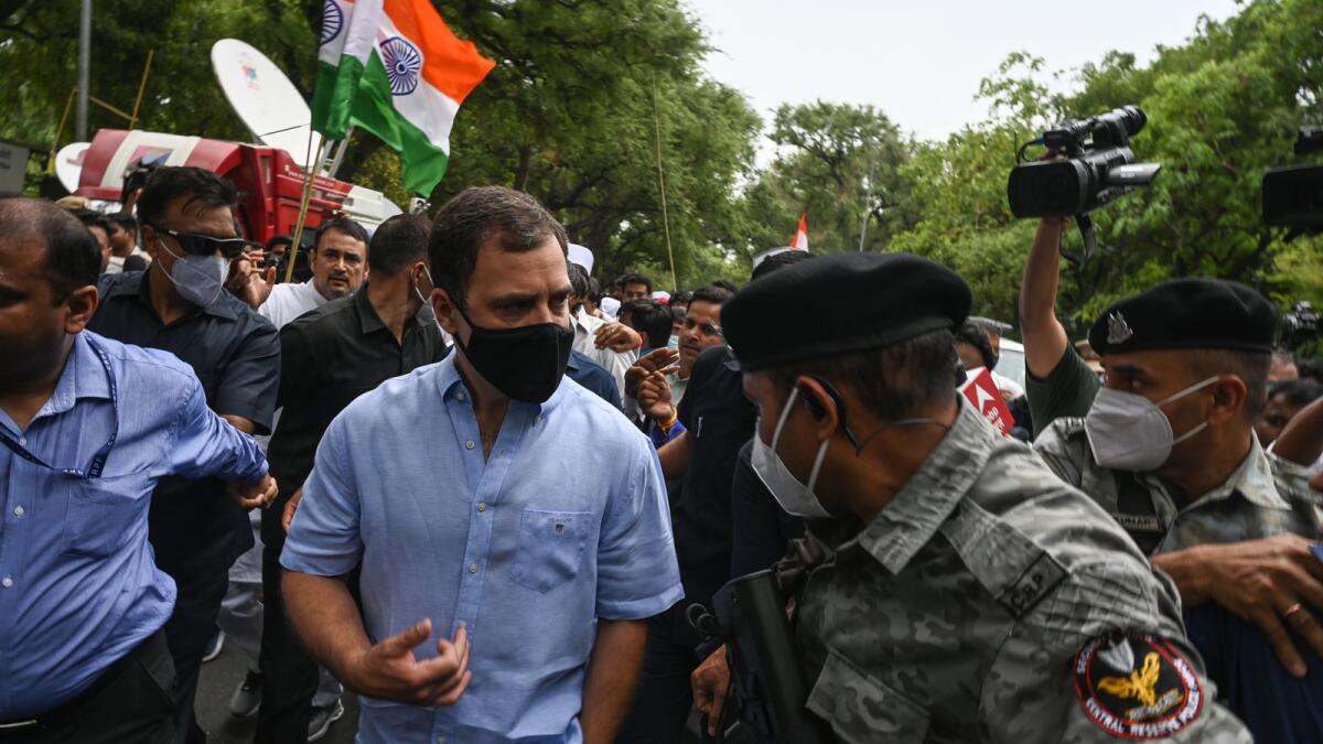 Congress leader Rahul Gandhi (C) marches on foot towards Enforcement Directorate (ED) office. Photo: AFP