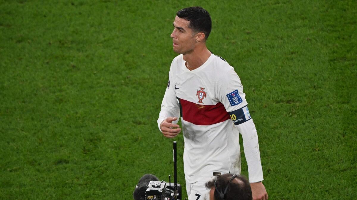 Cristiano Ronaldo leaves the field after losing to Morocco 1-0 in the Qatar 2022 World Cup quarter-final football match against Morocco. — AFP