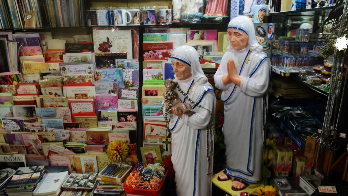Souvenirs of Mother Teresa are displayed in a gift shop on the eve of the canonisation of Mother Teresa in Rome, in Kolkata on September 2, 2016. As the Vatican prepares to declare Mother Teresa a saint on September 4, in the Indian city where she rose to fame, claims of medical negligence and financial mismanagement at her care homes threaten to cloud her legacy. AFP