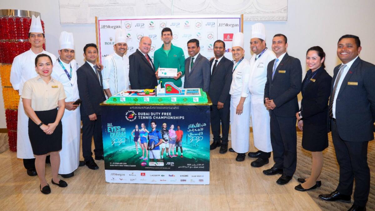 World No.1 Novak Djokovic with the hotel staff. — Dubai Duty Free Tennis