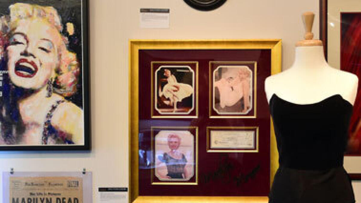 Marilyn Monroe dress, royal wedding cake slices up for auction
