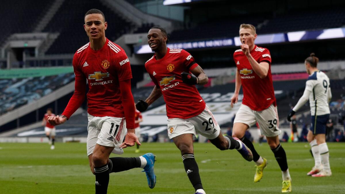 Manchester United's English striker Mason Greenwood celebrates his team's goal against Tottenham Hotspur during the English Premier League match. — AFP